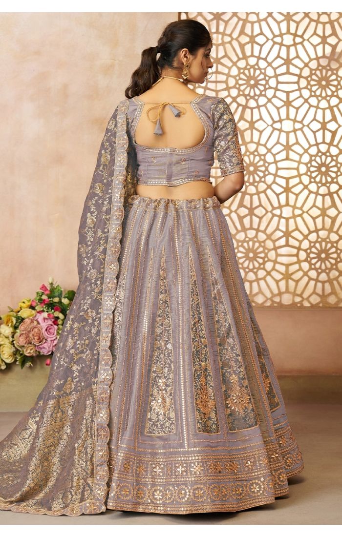 Back design of onion pink bridal lehenga with tie-up blouse and Banarasi dupatta – Appelle Fashion USA.