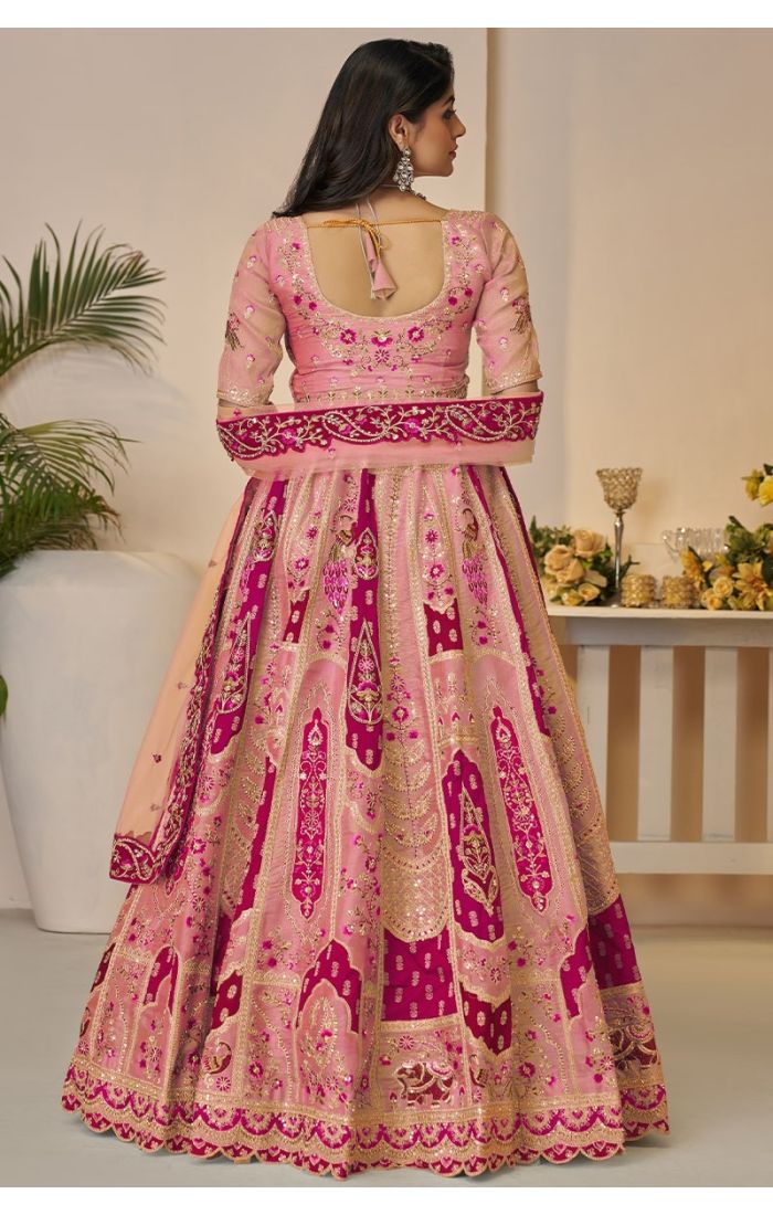 Back view of onion pink brocade bridal lehenga with zari embroidery