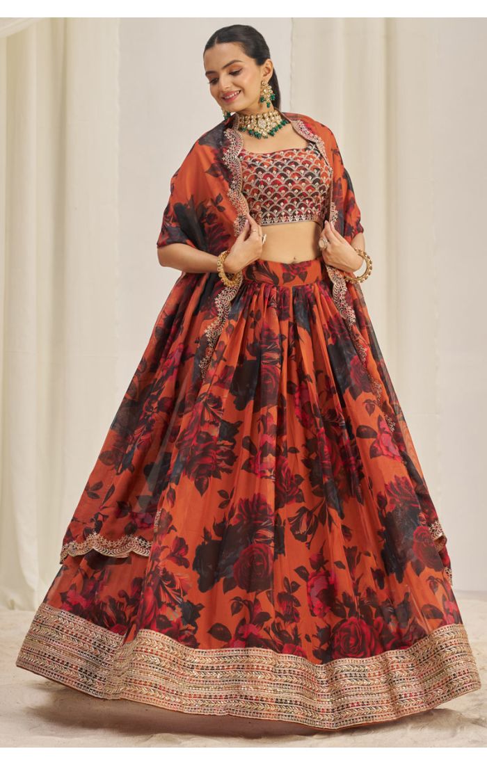 Twirling orange floral organza lehenga choli for Navratri party
