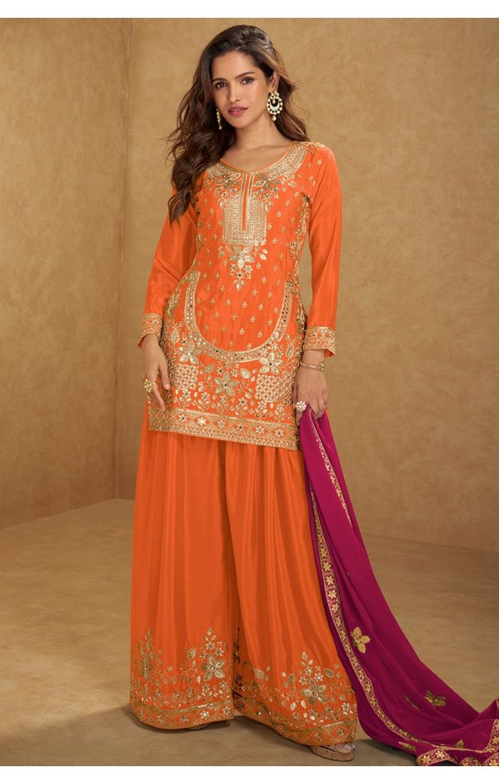 Orange real chinon salwar kameez with fuchsia dupatta and palazzo pants – festive wear.