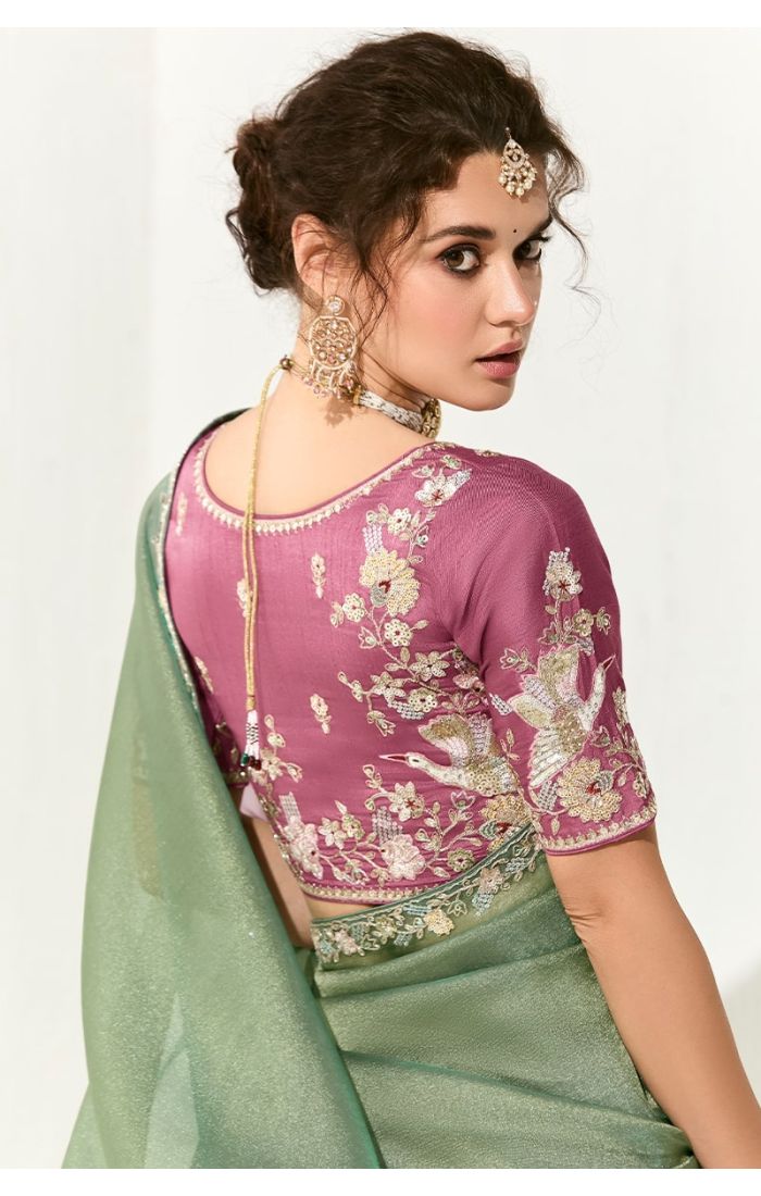 Back view highlighting intricate embroidery on pink silk blouse – wedding saree for Canada