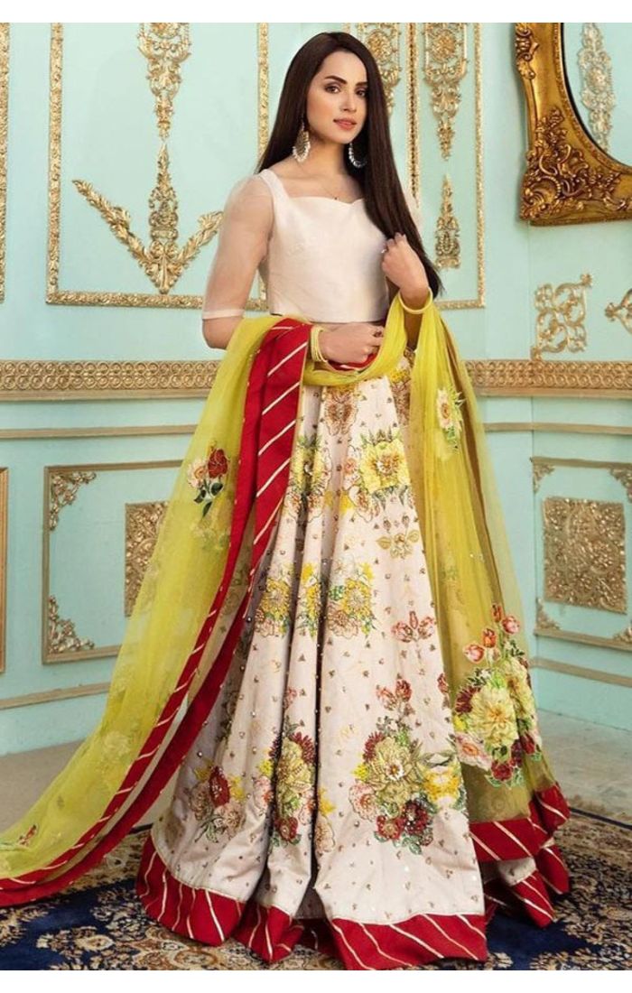 Peach Designer Silk Lehenga Choli with Intricate Embroidery