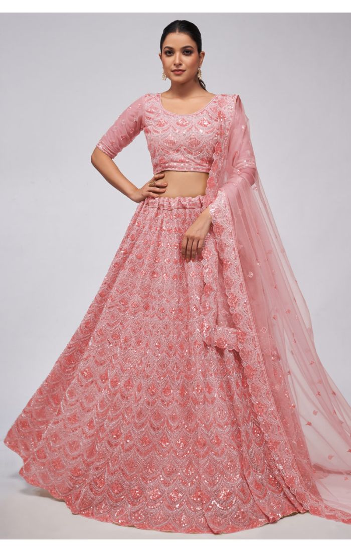 Peach Embroidered Net Bridal Lehenga with Sequins Detailing for Weddings and Receptions.