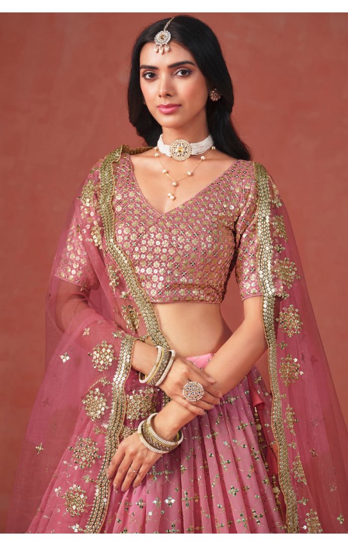 Close-Up of Peach Georgette Lehenga Set with Net Dupatta