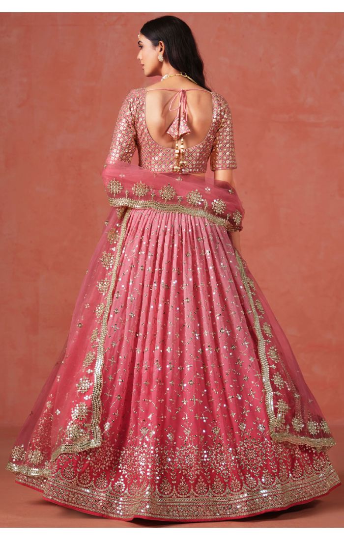 Full View of Peach Georgette Lehenga Set with Net Dupatta