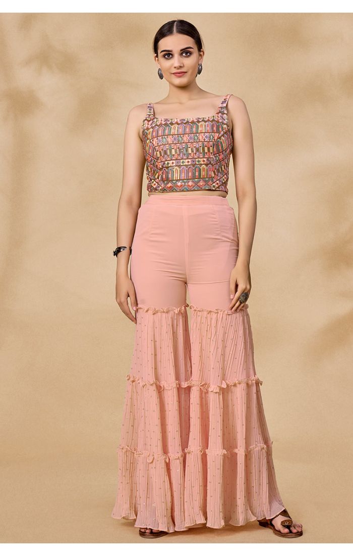 Full peach georgette palazzo set with embroidered crop top and long jacket, perfect for Garba and Navratri