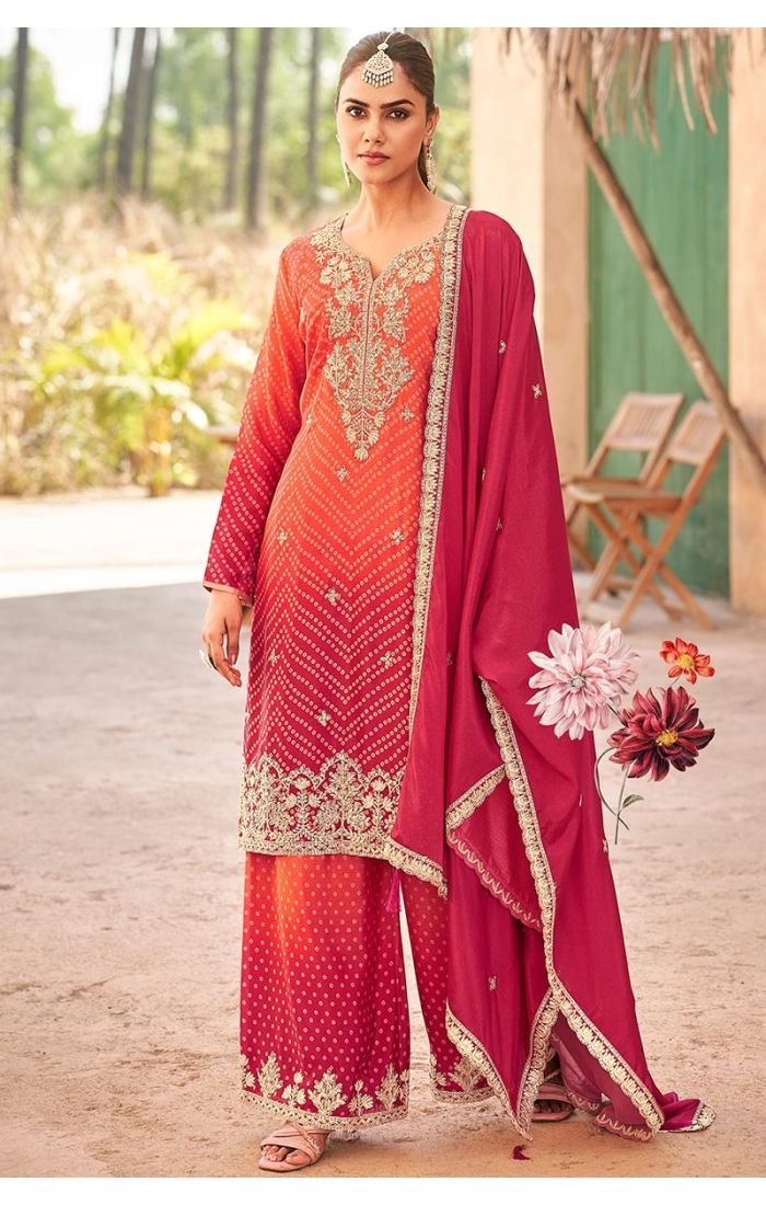 Front view of peach & rani pink chinon salwar suit with organza dupatta and intricate embroidery