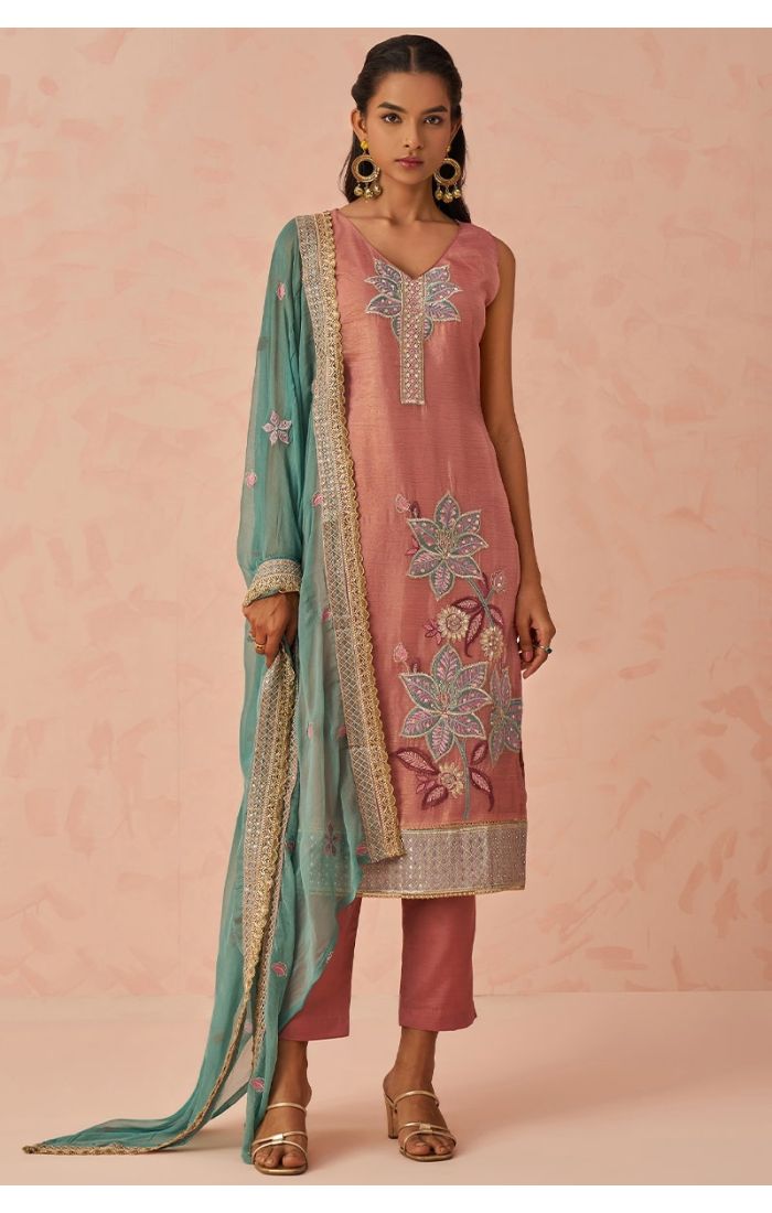 Front view of pink embroidered salwar kameez with teal net dupatta and gold lace by Appelle Fashion