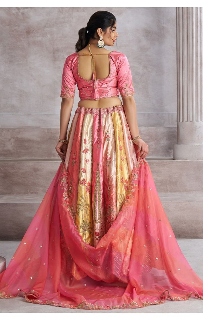 Back view of pink silk lehenga with scalloped hem and sheer dupatta – Indian Wedding Lehenga