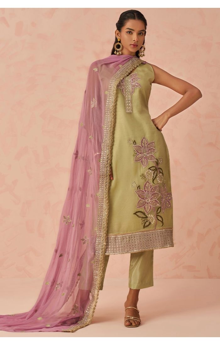 Full front view of pista green fancy silk salwar kameez with pink chiffon dupatta, floral embroidery and lace border