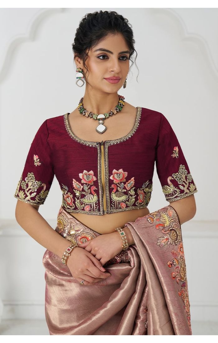 Close-Up of Embroidery on Pink Silk Saree