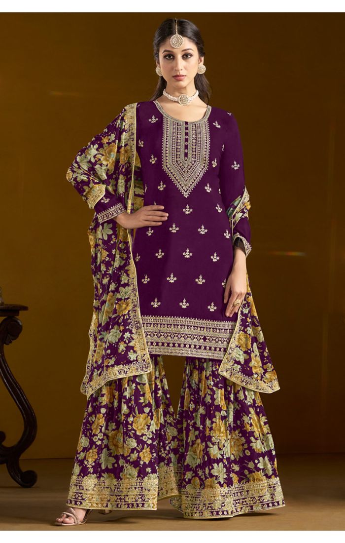 Front full view of purple embroidered sharara suit with floral dupatta