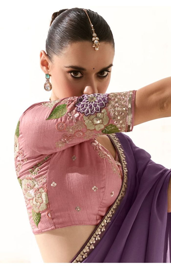 Close-up artistic front look highlighting blouse embroidery and elegant styling of purple organza saree.
