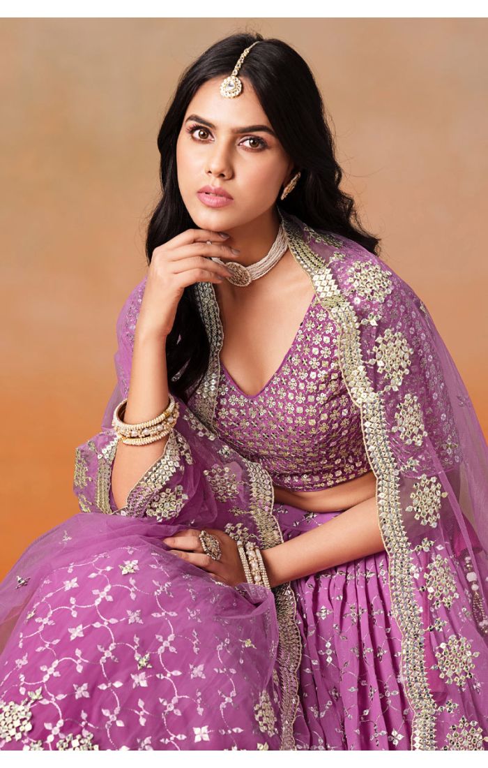 Rani Pink Bridal Lehenga Close-Up with Thread and Zari Work in UK Wedding