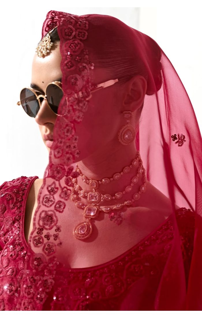  Side profile of model in bridal pose showcasing intricate stone and lace work
