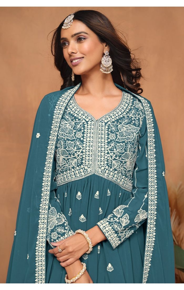 Close-up of neckline and embroidery detailing on blue sharara suit.