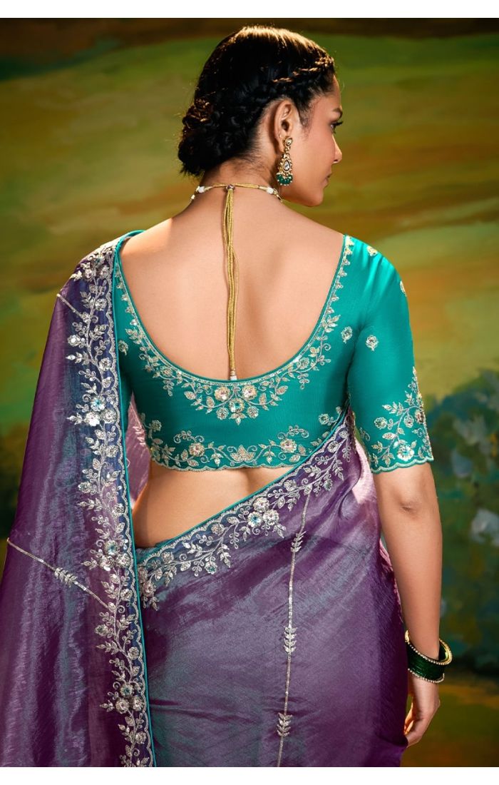  Back view of purple organza saree showing embroidery details with rama green blouse