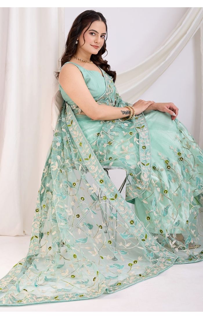  Close-up of Designer Embroidery Work on Sea Green Soft Net Saree with Matching Blouse