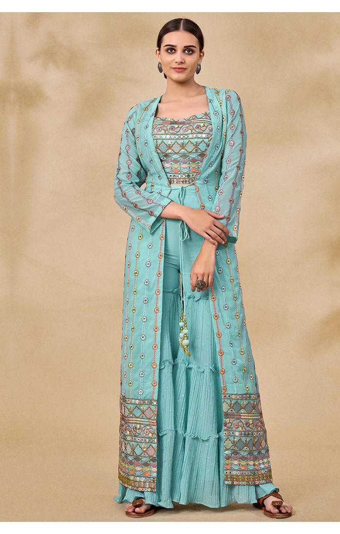 Aqua blue georgette Navratri jacket set with embroidered mirror work crop top and tiered sharara pants — front view