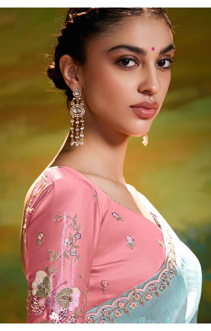 close up Detailed shot of lace border and stone work on sky blue saree