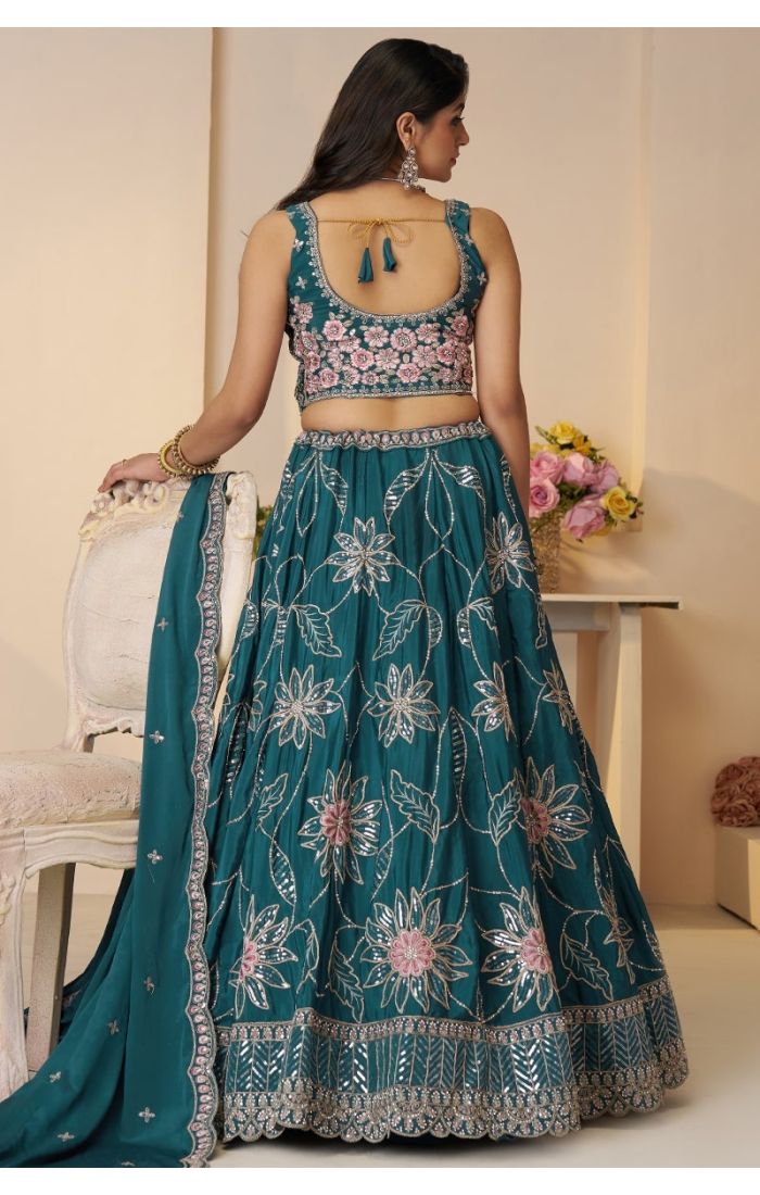  Back design of blue embroidered lehenga with floral dupatta