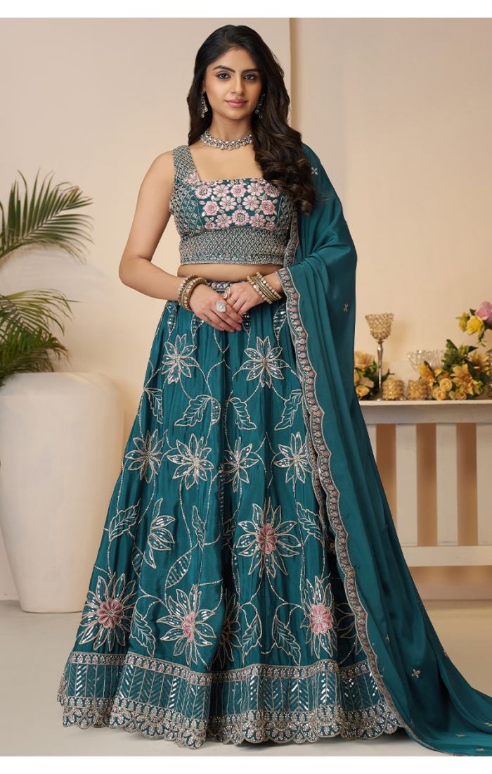  Front view of blue bridesmaid lehenga with sequin and floral work
