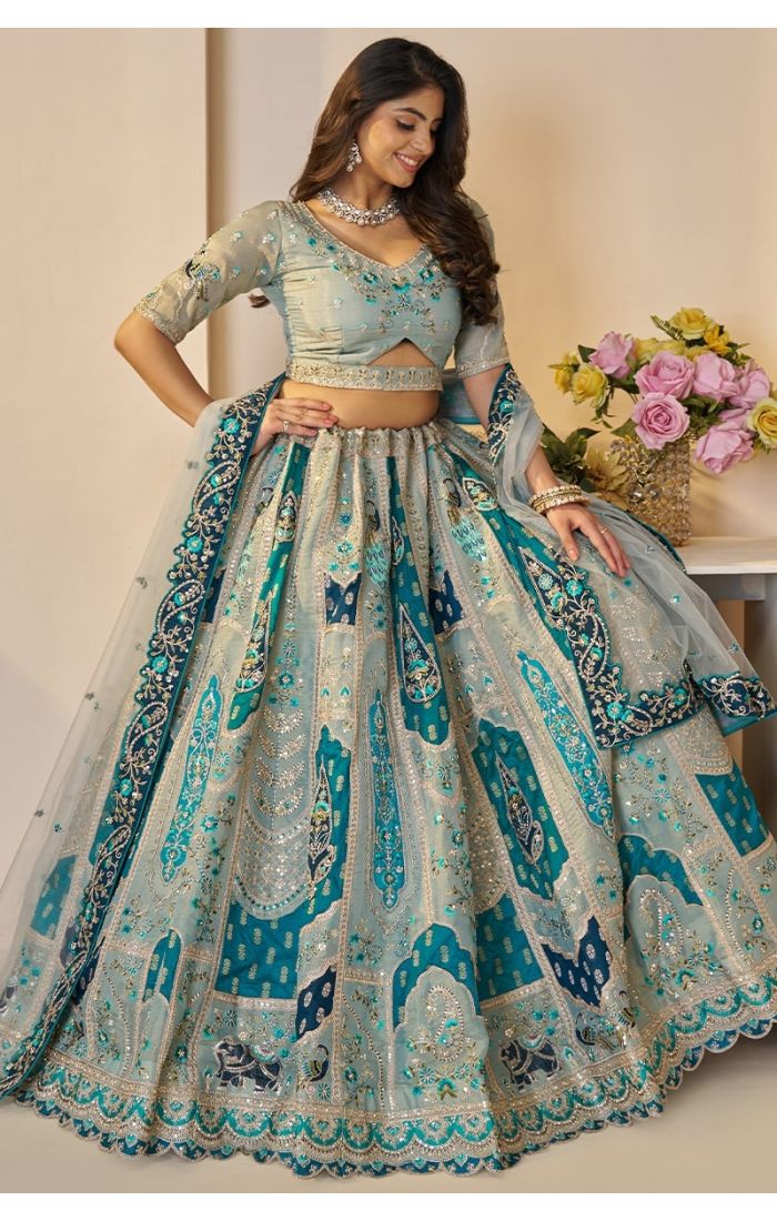  Side profile showcasing lehenga flare and intricate elephant patches
