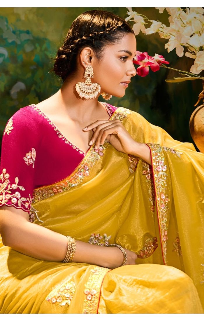 Side drape showcasing sequins and zari work on mustard organza saree
