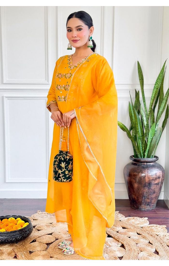 Elegant yellow embroidered kurti set for weddings and festive occasions with a dupatta