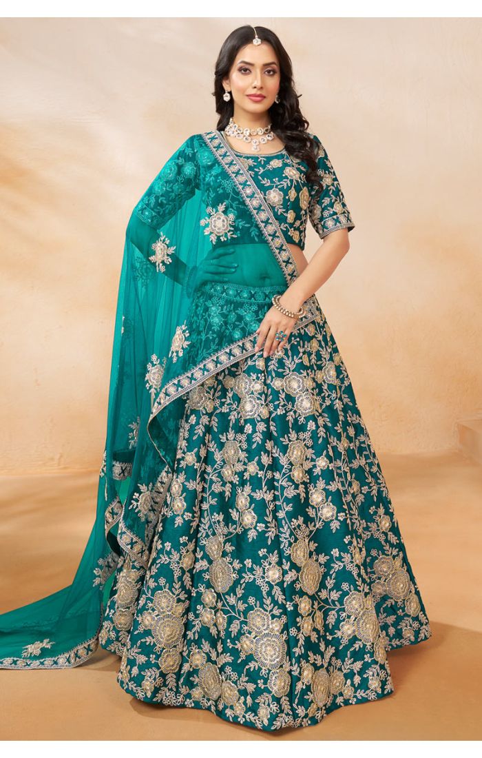 Teal Embroidered Lehenga Choli Set with intricate floral embroidery, matching blouse, and lightweight dupatta for weddings and festive occasions worldwide.