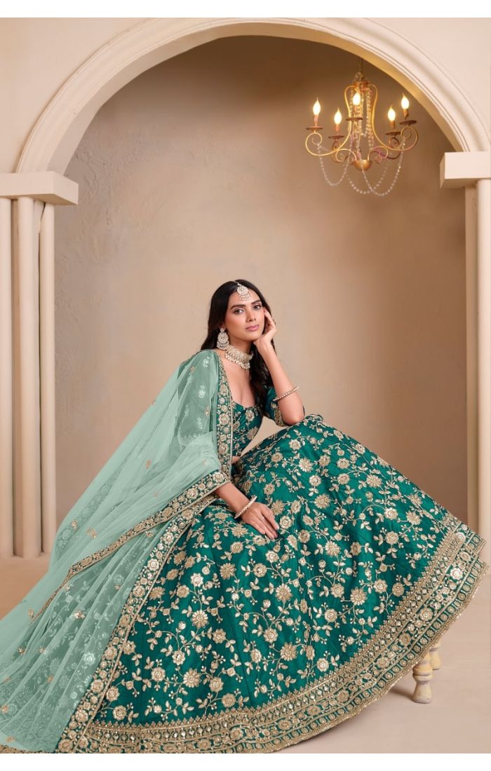 Emerald Grace Lehenga Set with intricate zari embroidery and sequin detailing, green lehenga choli with soft net dupatta, traditional Indian wedding and festive wear for women
