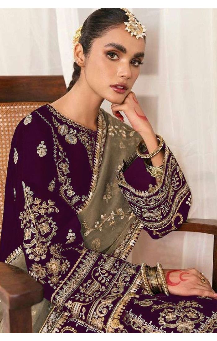Velvet wine embroidered salwar suit with olive net dupatta for wedding and festive occasions