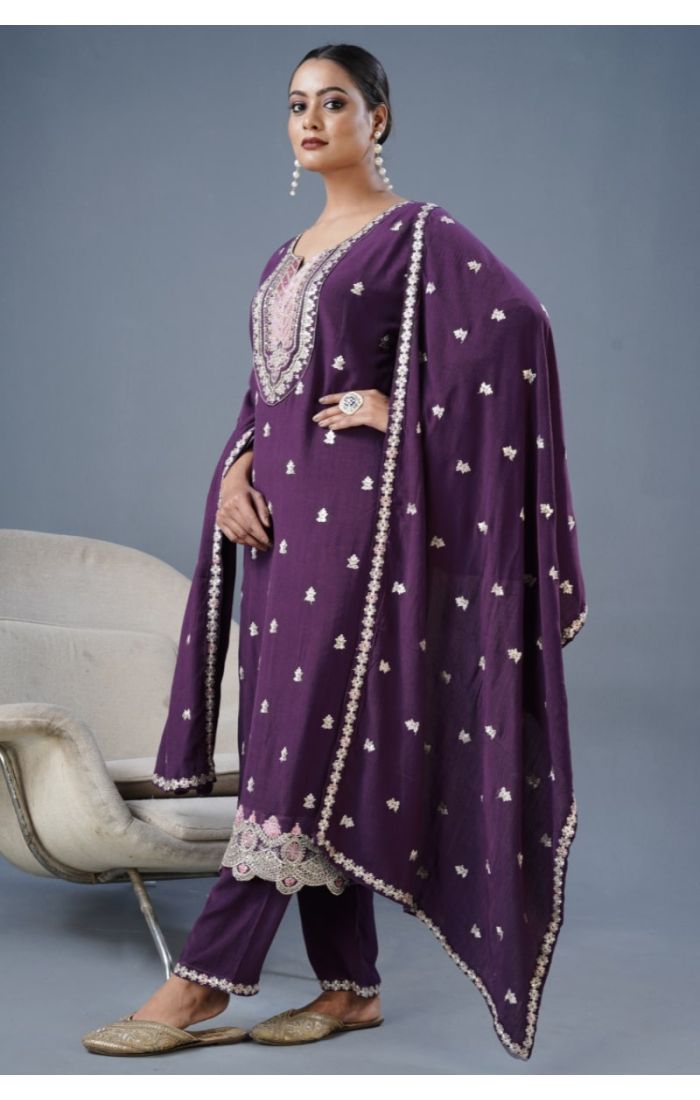 Woman in wine cotton kurta with embroidered neckline and floral dupatta
