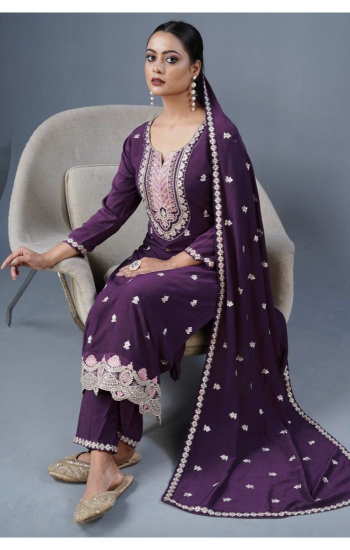 Woman in wine cotton kurta with embroidered neckline and floral dupatta