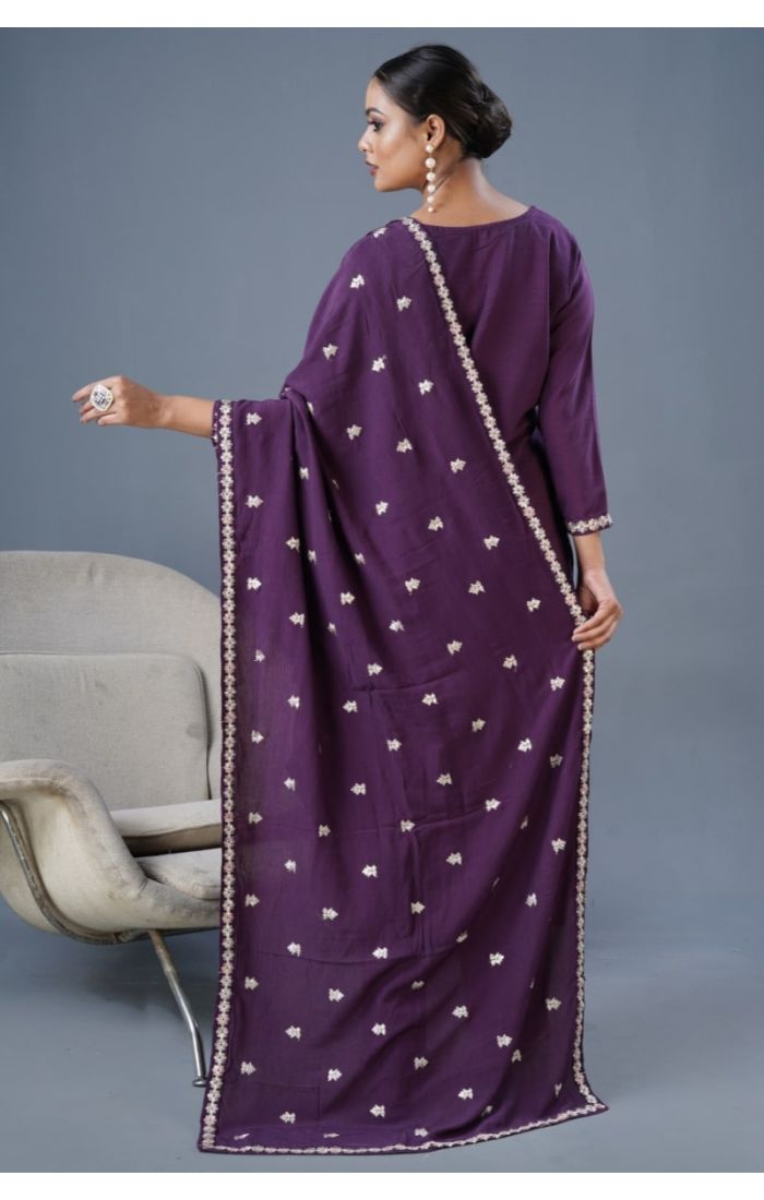 Woman in wine cotton kurta with embroidered neckline and floral dupatta