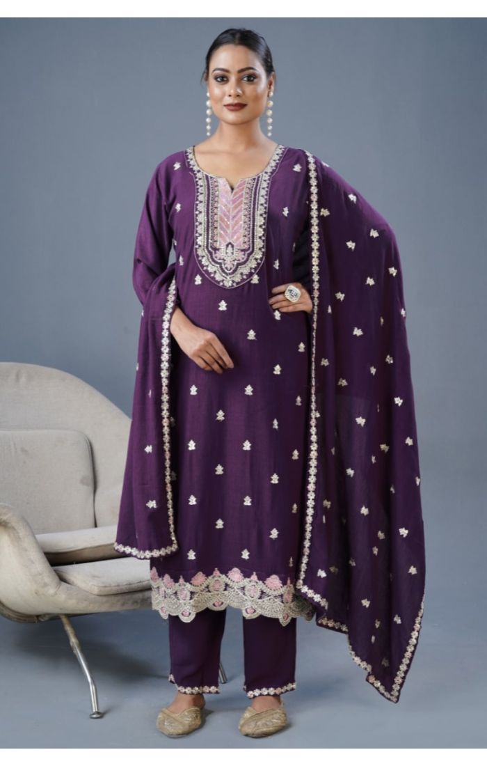 Woman in wine cotton kurta with embroidered neckline and floral dupatta