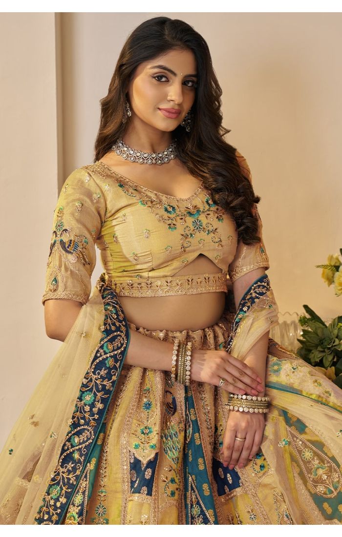 Close-up of blouse embroidery and jewelry styling